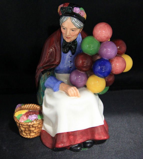 Royal Doulton "The Old Balloon Seller" H.N. 3737: Retired Royal Doulton porcelain figure entitled "The Old Balloon Seller" H.N. 3737, issued 1999 for Michael Doulton event series. Height is 7 1/2" tall. Designer L. Harradine. For Domestic or Internat