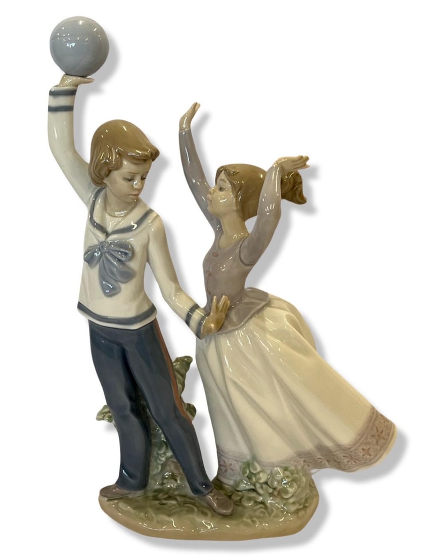 Lladro #5304 Children at Play Porcelain Figurines: Lladro #5304 Children at Play Porcelain Figurines measures H: 10 3/4"
