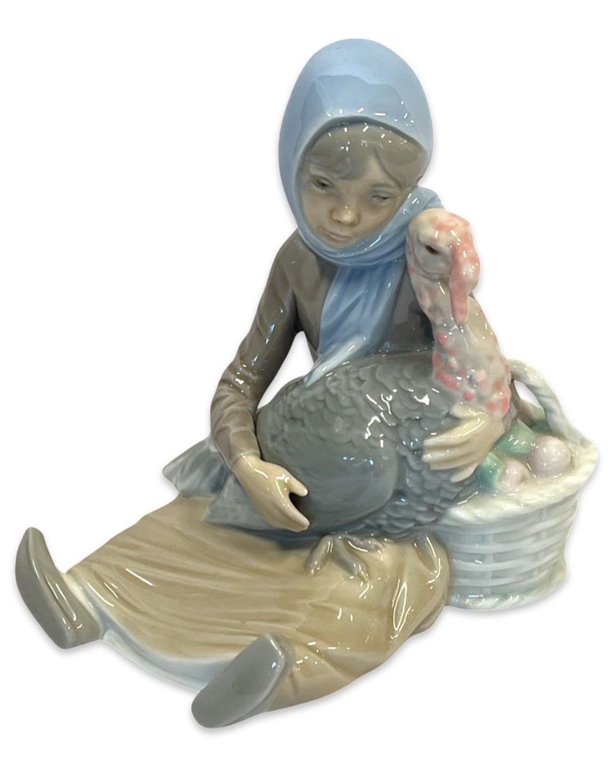 Lladro #4569 Girl with Turkey Porcelain Figurines: Lladro #4569 Girl with Turkey Porcelain Figurines measures H: 6"