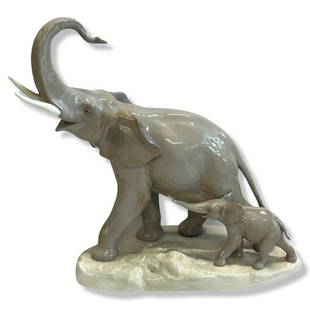 Lladro #1151 Mother with Calf Elephants Figurines: Lladro #1151 Mother with Calf Elephants Figurines measures H: 11 1/2"