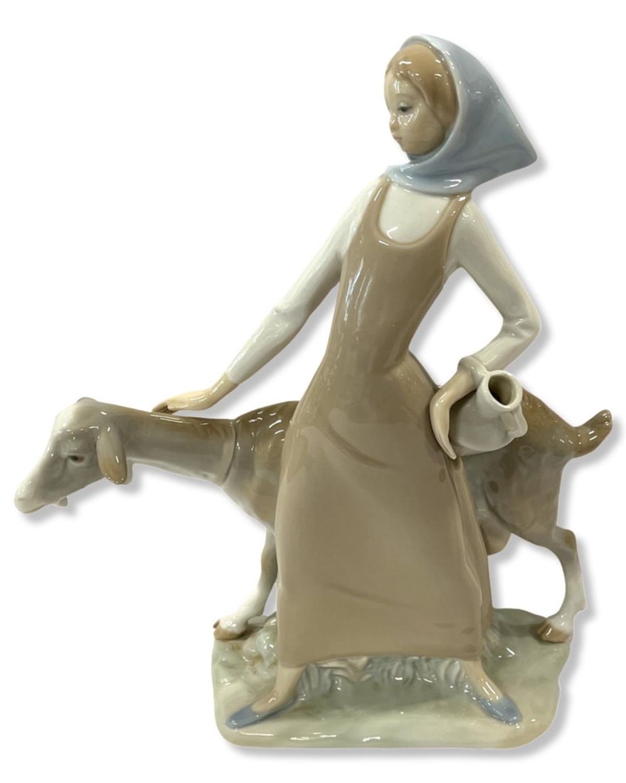 Lladro #4590 Girl with Pitcher & Goat Porcelain Figurines: Lladro #4590 Girl with Pitcher & Goat Porcelain Figurines measures H: 11" x W: 9"