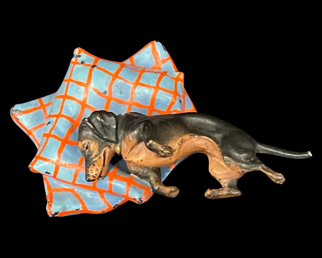 Vienna Style Hand Painted Cast Iron Dachshund with Pillow: Vienna Style Hand Painted Cast Iron Dachshund with Pillow measures L: 3 1/2". Sold as is