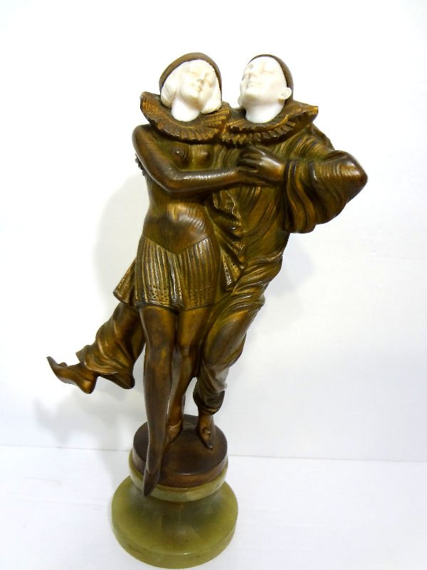 Peter Tereszczuk Austrian Bronze & Ivory Group: Peter Tereszczuk austrian bronze & ivory two figure group of a mail and femail dancer in pierrot costumes. Signed Peter Tereszczuk (1875-1963) on green onyz base. Figure measures 9", on a 1 3/4" base.