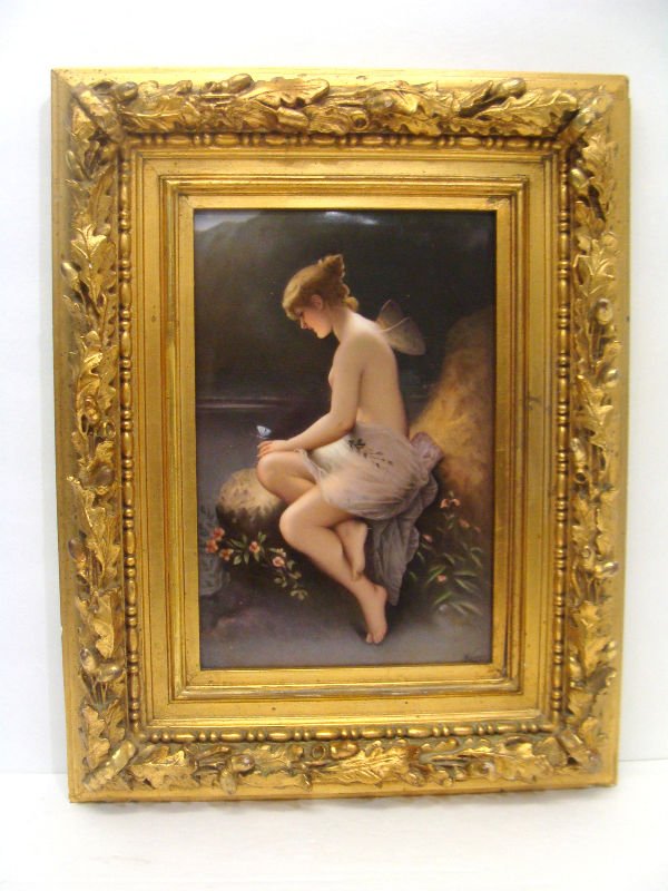 KPM Porcelain Plaque of a Fairy Signed Wagner: KPM porcelain hand painted plaque of a fairy signed Wagner. The figure seated on a rock near an ocean with the mountains in the background. Signed lower right. Wagner. Measures 9 1/2 inches x 6 1/2 in