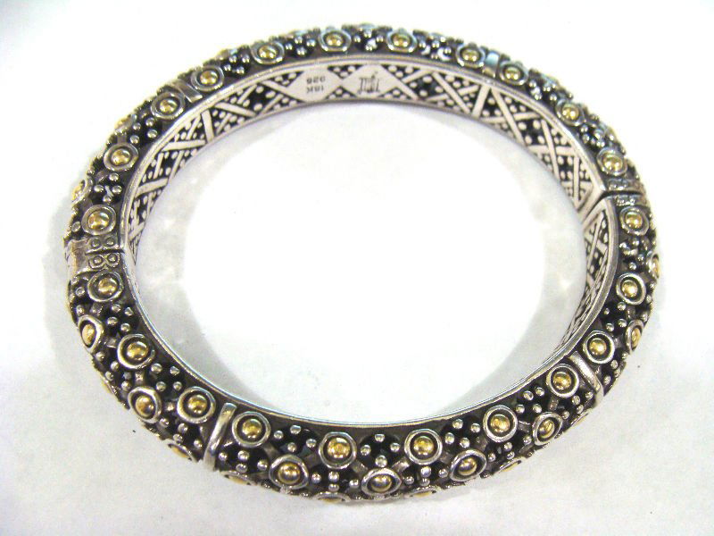 John Hardy 925 & 18kt Yellow Gold Bangle.: John Hardy 925 and 18kt yellow gold bangle marked JH 18k 925. Weighs 34.5dwt. For Domestic or International Shipping Quotes Please Feel Call Ryan or Dave at Eagle Shipping Center 561-932-0700 or email