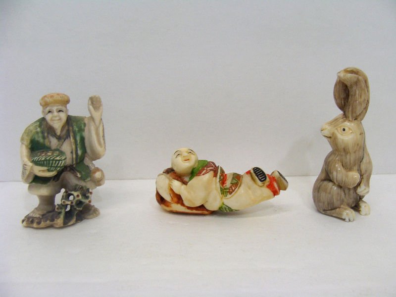 3 Chinese Ivory Polychrome Figures: 3 Chinese ivory polychrome Netsuke. An elder, a young boy and rabbit. Measurements range from 3/4" to 2 3/8" tall. For Domestic or International Shipping Quotes Please Feel Call Ryan or Dave at Eagle 