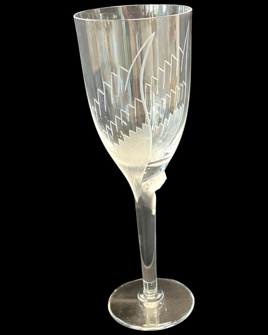 Lot of Three Lalique France Crystal Winged Angel Champagne Flutes: Lot of Three Lalique France Crystal Winged Angel Champagne Flutes measures H: 8"