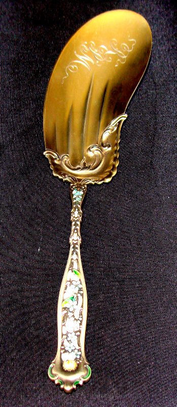 Gorham Sterling Enamel Dresden Fried Oyster: Gorham-Whiting sterling silver Dresden fried oyster server with enamel work on handle on both front and back. Hallmarks on back. Three initials in gold wash bowl. Measures 9 inches long. For Domestic 