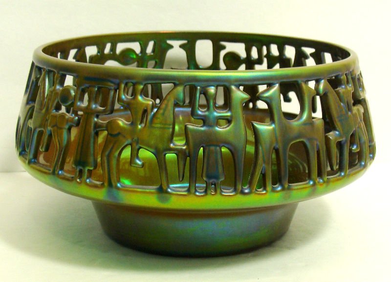 Zsolnay Iridescent Bowl: Zsolnay iridescent reticulated glass round bowl. Measures 4 3/8 inches high x 7 1/8 inch diameterFor Domestic or International Shipping Quotes Please Feel Call Ryan or Dave at Eagle Shipping Center 56