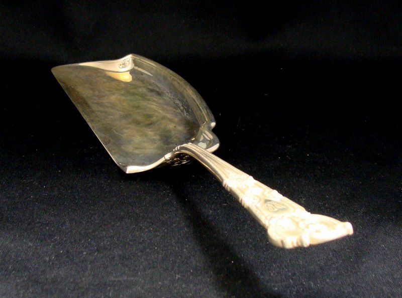 Tiffany Sterling Renaissance Ice Cream Slicer: Tiffany sterling silver Renaissance pattern ice cream slicer, measures 13 inches length. Marked Tiffany Studios Sterling Pat 1905. For Domestic or International Shipping Quotes Please Feel Call Ryan o