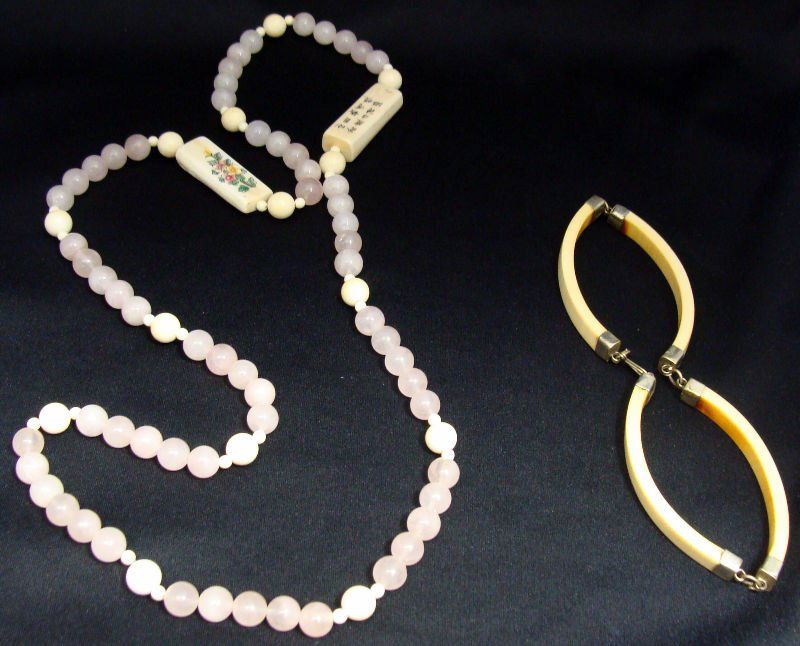 2 Chinese Rose Quartz & Ivory Necklaces: Chinese rose quartz and polychrome ivory necklace and a 4 sectional ivory choker. Necklace measures 17 1/2" long. Choker measures 12" long. For Domestic or International Shipping Quotes Please Feel Ca