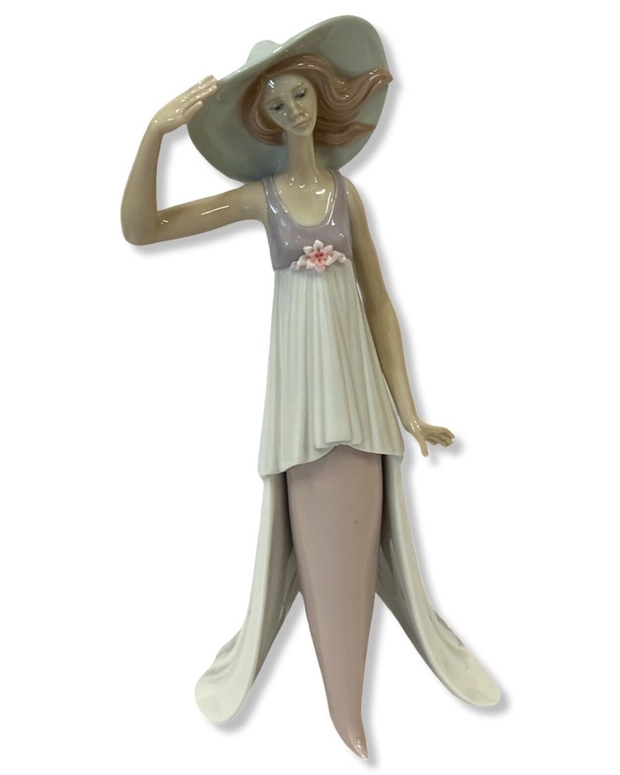 Lladro #6236 Lady of Monaco Porcelain Figure: Lladro #6236 Lady of Monaco Porcelain Figure measures H: 13 3/4"