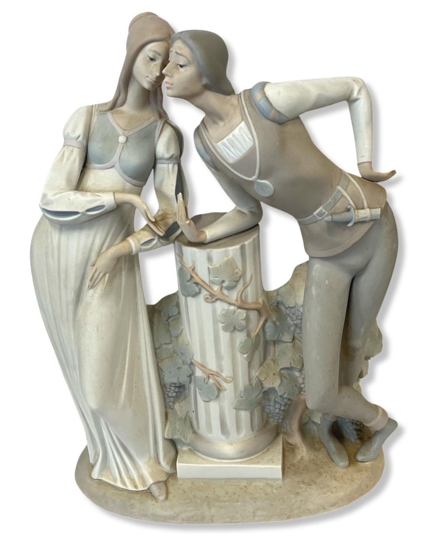 Lladro Romeo & Juliet Porcelain Figurines: Lladro Romeo & Juliet Porcelain Figurines measures 17" x 12". Sold as is