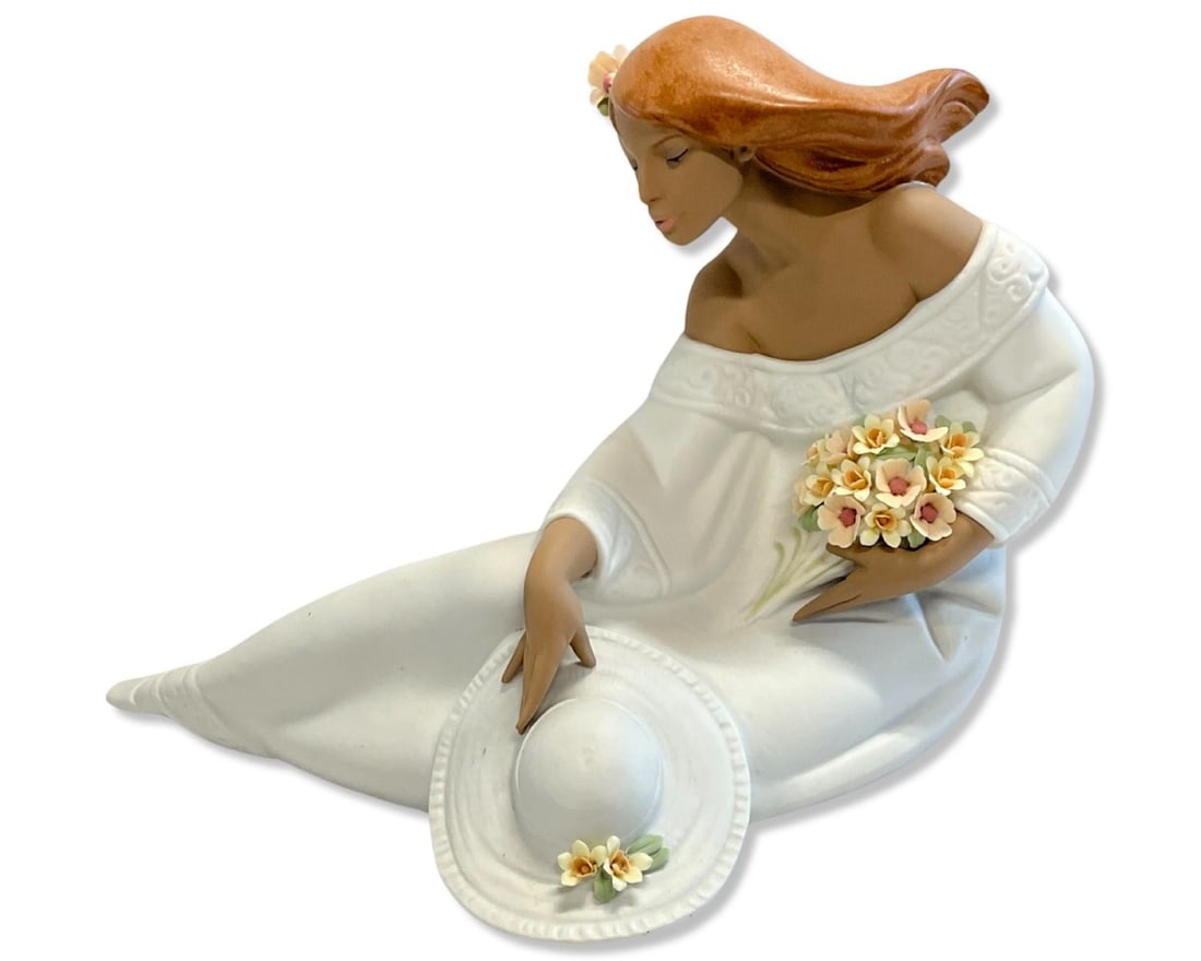 Lladro #2405 Midday Porcelain Figure: Lladro #2405 Midday Porcelain Figure measures H: 11" x W: 15". Some flowers are missing, sold as is