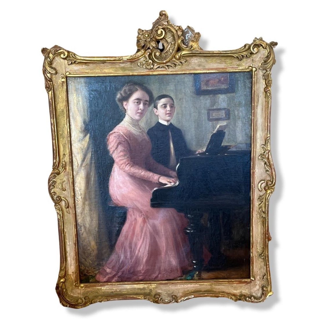 Signed Maximilian Kurth Oil Painting on Canvas Woman and Boy Playing Piano in Carved Gilt Frame: Signed Maximilian Kurth Oil Painting on Canvas Woman and Boy Playing Piano in Carved Gilt Frame. Signed lower right, measures H: 26" x W: 22", 2" frame