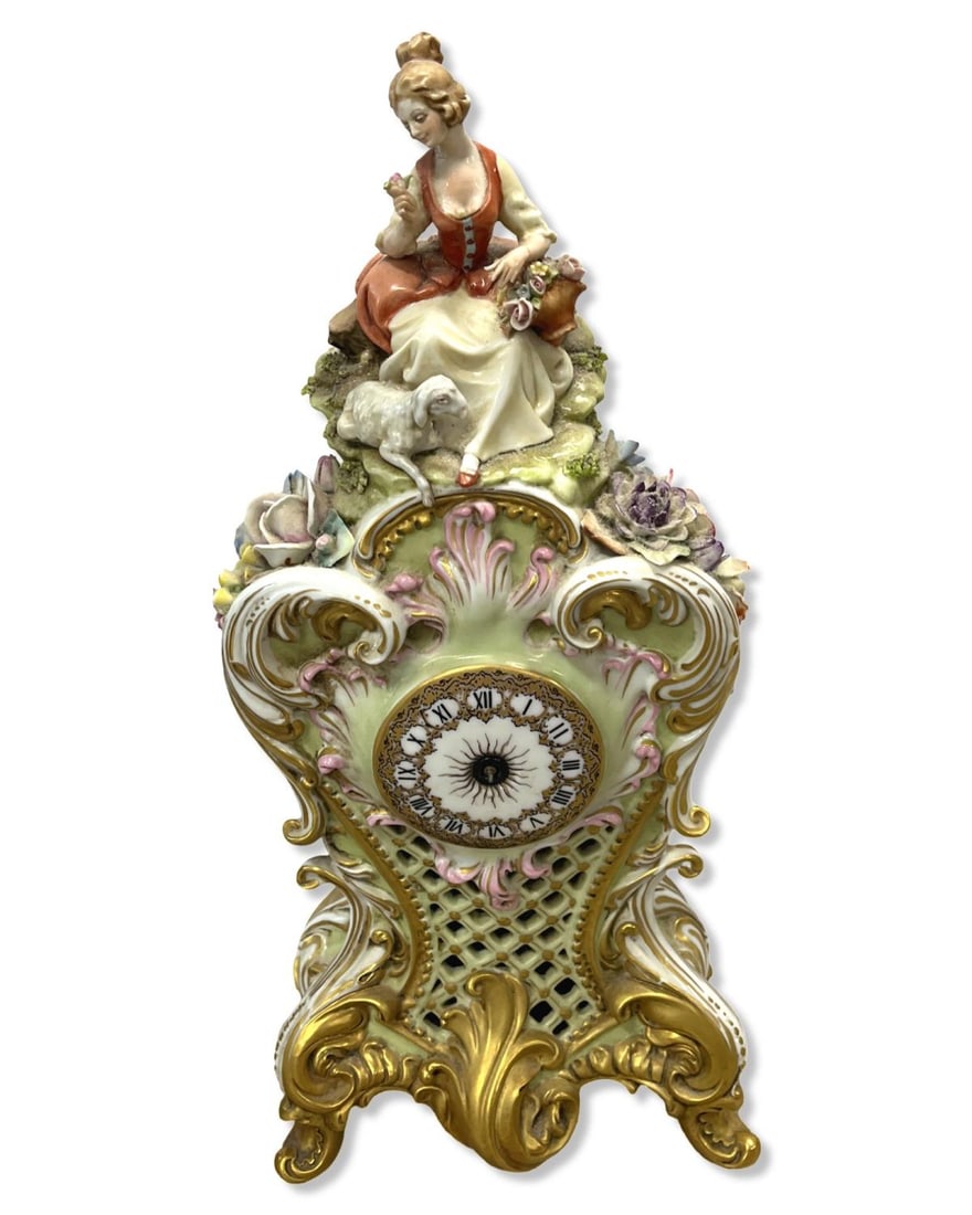 Bruno Merli Capodimonte Porcelain Mantle Clock: Bruno Merli Capodimonte Porcelain Mantle Clock measures 18" x 9" x 4". Lot has small chips, sold as is