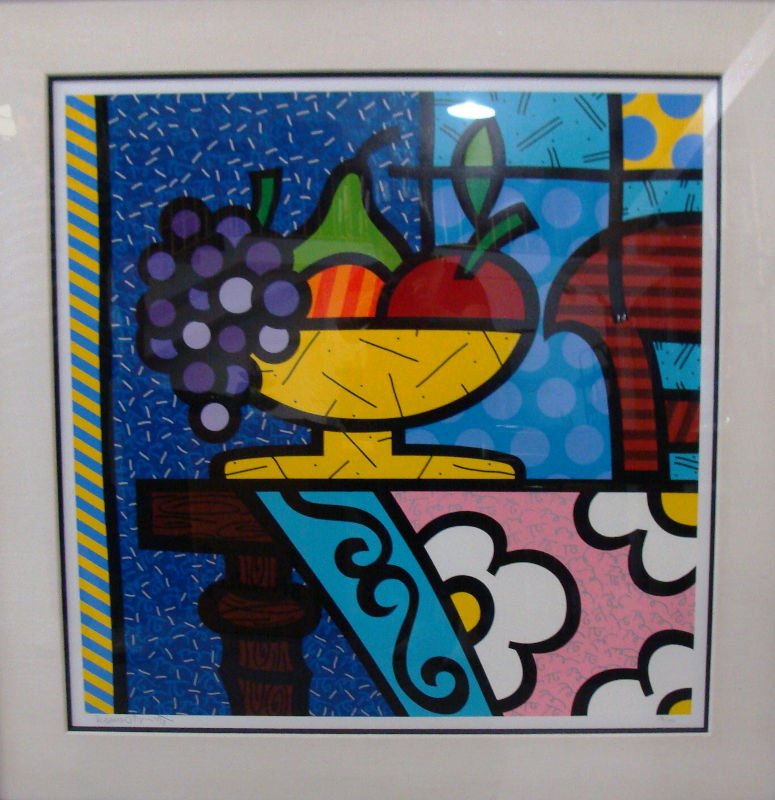 Romero Britto Lithograph: Romero Britto Lithograph depicting very colorful fruit on a table. Measures 37 1/2" high x 37 1/2" wide. Matte and frame measures 6 1/4". Eidition 136/300.For Domestic or International Shipping Quotes
