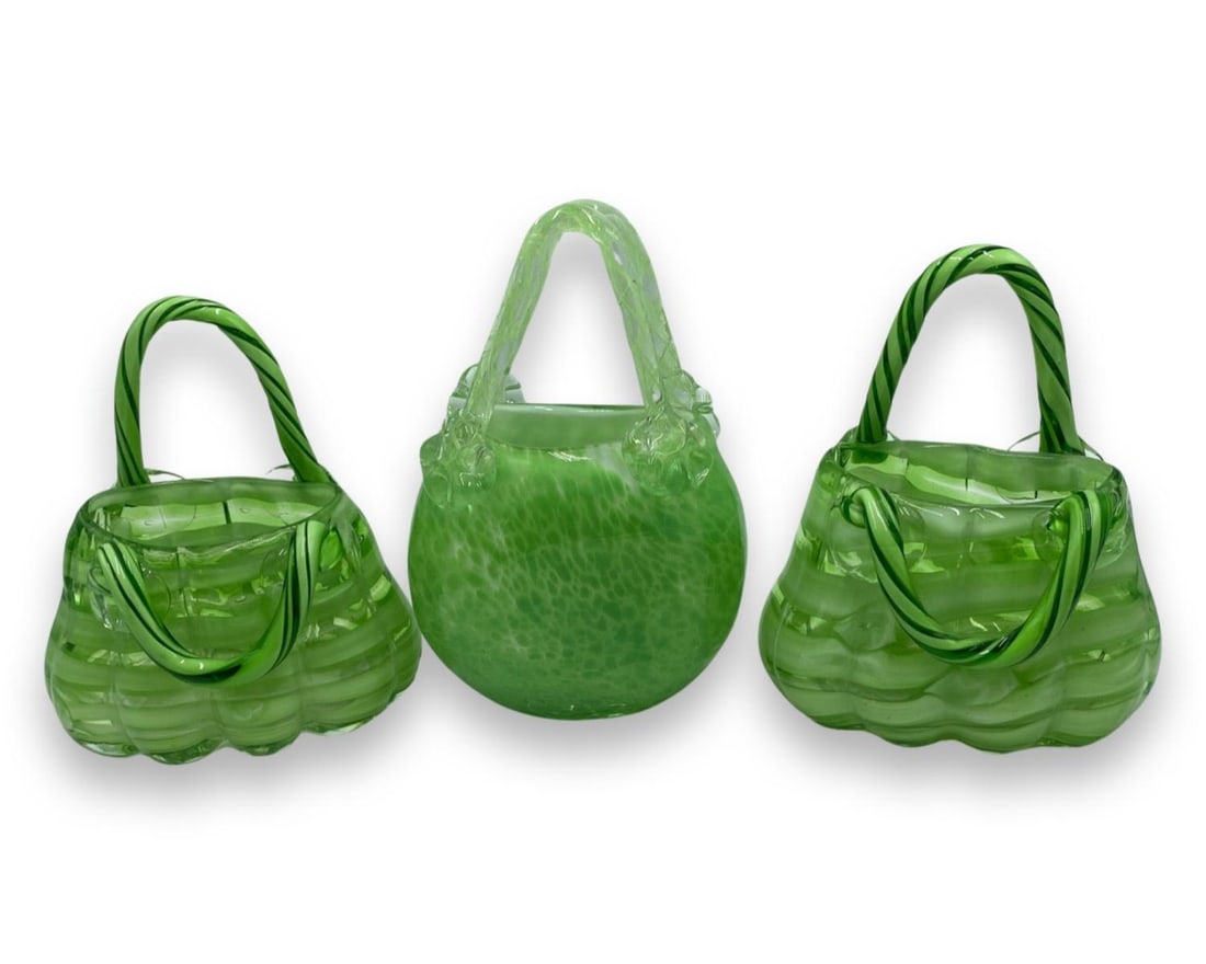 Lot of Three Vintage Murano Art Glass Green Swirl Purses: Lot of Three Vintage Murano Art Glass Green Swirl Purses. Largest measures H: 8"