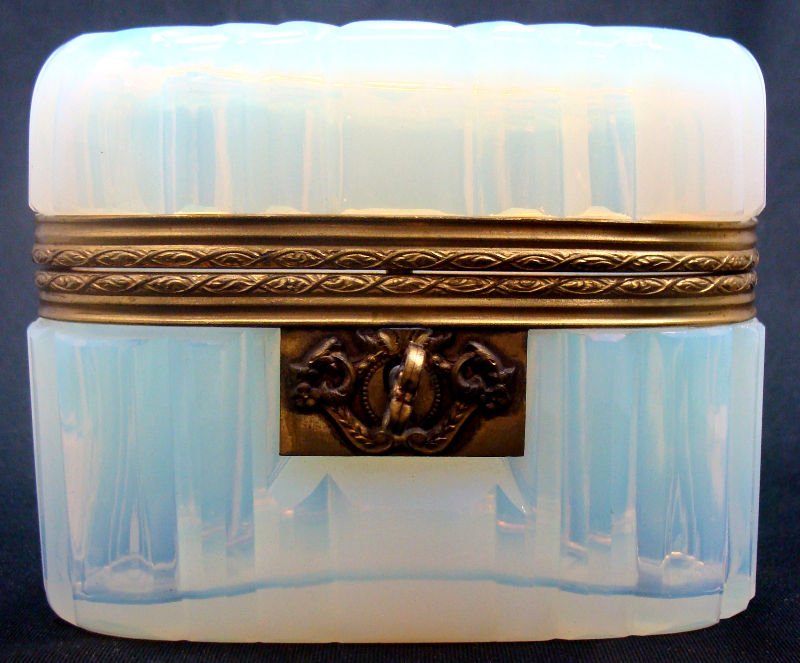 Opaline Oval Covered Box: Opaline oval hinged covered box. Measures 3 1/2" high x 4 1/2" long x 3" depth. For Domestic or International Shipping Quotes Please Feel Call Ryan or Dave at Eagle Shipping Center 561-932-0700 or ema