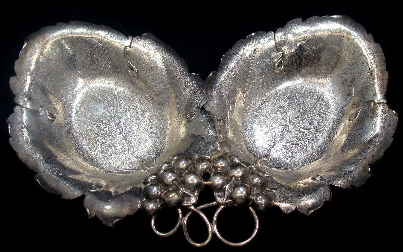 Watson Sterling Grape & Vine Dish: Watson sterling silver grape and vine dish #A33 marked Watson(old marks). Measures 10 1/4" long x 6 7/8" wide. Weighs 11 toz. For Domestic or International Shipping Quotes Please Feel Call Ryan or Dav