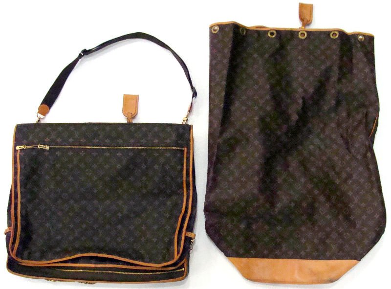 2 Piece Louis Vuitton Luggages: 2 pieces Louis Vuitton luggages. Louis Vuitton Malletier garment bag measures 38 1/2"high x 23"wide x 3" depth. Sac Marin Luggage Duffle measures 35" high x 23 1/2" wide. For Domestic or International