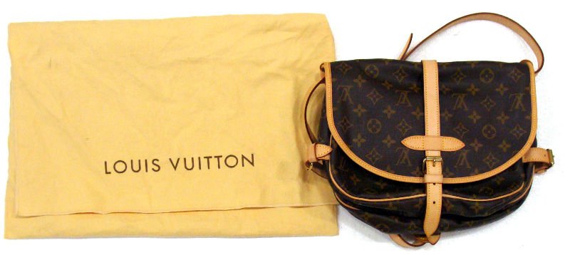 Louis Vuitton Ladies Bag: Louis Vuitton ladies purse, double sided with original pouch. Measures 9 1/2" folded and opens up to 19". For Domestic or International Shipping Quotes Please Feel Call Ryan or Dave at Eagle Shipping 