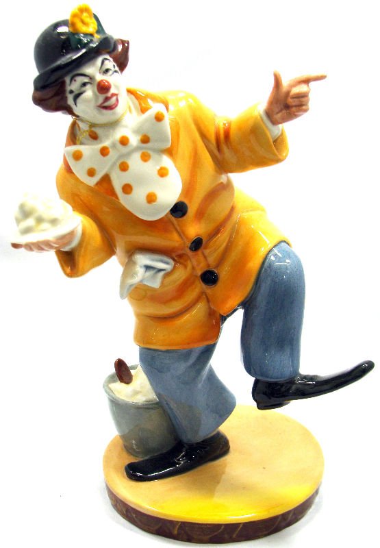 Royal Doulton "The Clown" HN 2890: Royal Doulton porcelain figure titled "The Clown" HN 2890 issues 1978-1988. Measures 9 1/2" high. For Domestic or International Shipping Quotes Please Feel Call Ryan or Dave at Eagle Shipping Center 5