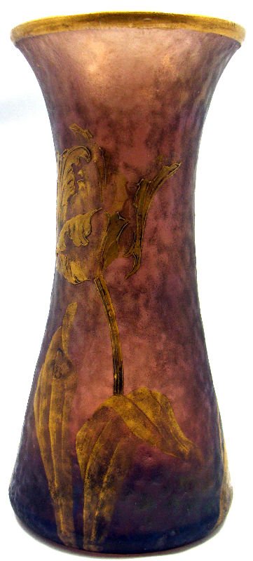 Mont Joye Art Glass Vase: Mont Joye art glass vase. This beautiful glass piece is crafted from iridescent purple glass and has flowers in relief painted in gold. The rim is also gilt. Mont Joye mark is found on the bottom of t