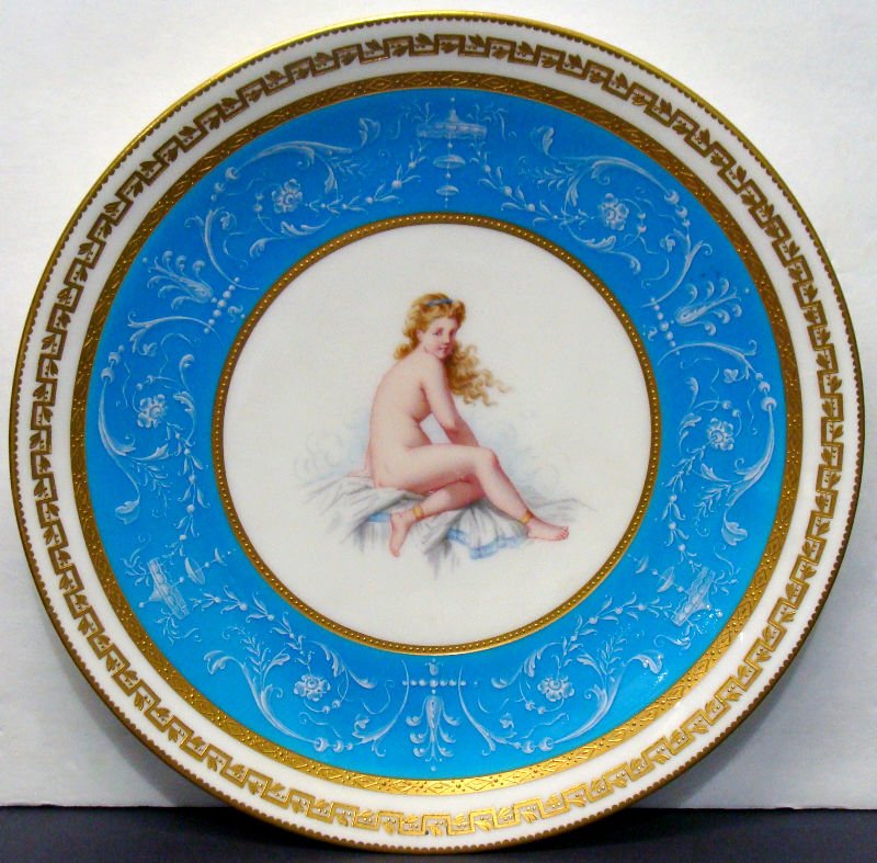 Minton Hand Painted Porcelain Plate: Minton hand painted porcelain plate depicting the figure of a nude woman in the center surronded by a large turquoise band followed by gilt trimmings. Beautifukky decorated plate stamped on back Minto
