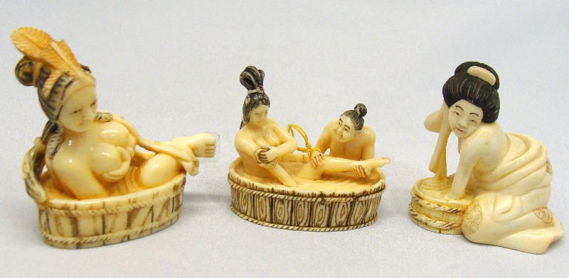 Three Chinese Erotic Ivory Netsuke: Three Chinese erotic ivory netsuke figures one depicting a nude woman relaxing, the second one is in a tub and the last one is a couple in a tub. For Domestic or International Shipping Quotes Please F