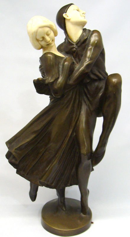 Peter Tereszczuk(Austrian 1875-1963) Bronze: Peter Tereszczuk(Austrian 1875-1963) bronze and ivory figure od two dancers in Pierrot costumes. Signed P.Tereszczuk. Made in Austria. Measures 11" high. For Domestic or International Shipping Quotes 