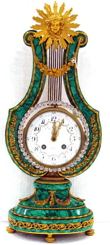 Antique French Bronze & Malachite Lyre Mantle Clock: Antique French bronze and malachite lyre mantle footed clock. Measures 18 1/2" x 7 1/2"For Domestic or International Shipping Quotes Please Feel Call Ryan or Dave at Eagle Shipping Center 561-932-0700