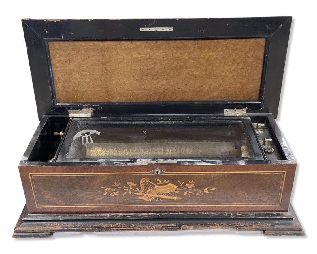 Swiss Cylinder Marquetry Inlaid Music Box: Swiss Cylinder Marquetry Inlaid Music Box measures 8" x 27" x 13". Sold as is