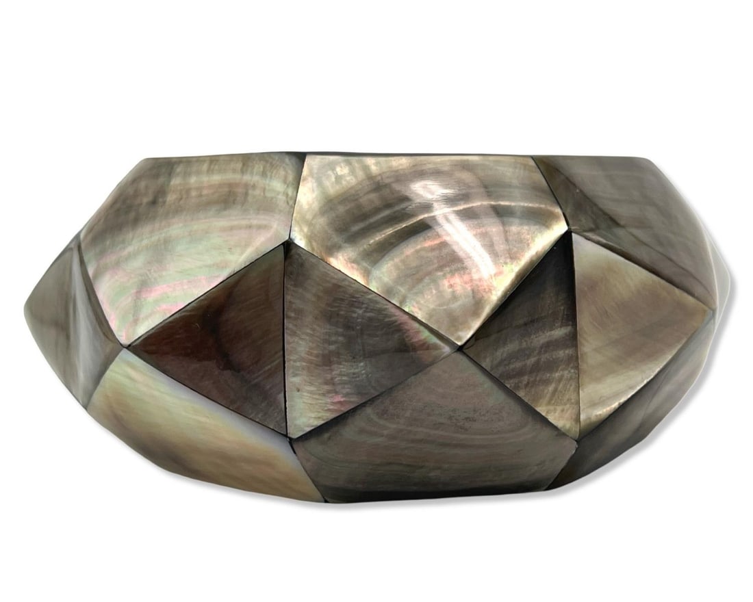 Viktoria Hayman Mother of Pearl & Black Mother of Pearl Faceted Pyramid Bangle: Viktoria Hayman Mother of Pearl & Black Mother of Pearl Faceted Pyramid Bangle H: 1 3/4" x DIA: 3 3/4". Retail Price $250.00
