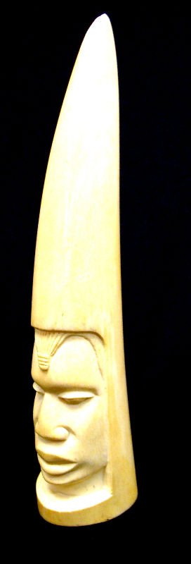 African Carved Ivory Figural Tusk: African carved ivory figural tusk. Measures 10 3/4" high. For Domestic or International Shipping Quotes Please Feel Call Ryan or Dave at Eagle Shipping Center 561-932-0700 or email them at ryan@eagles