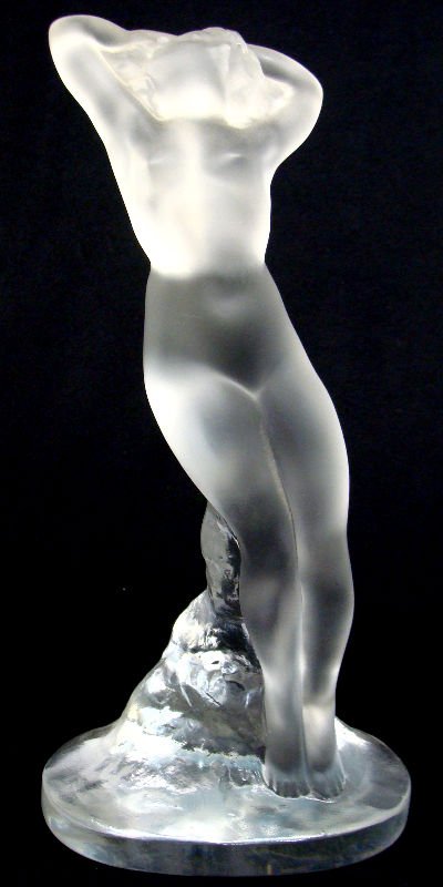 Lalique Crystal "Nude Arms Up": Lalique crystal figure "Nude Arms Up". Signed Lalique France. Measures 9 1/8" tall. For Domestic or International Shipping Quotes Please Feel Call Ryan or Dave at Eagle Shipping Center 561-932-0700 or