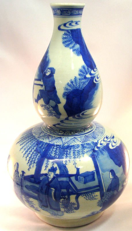 Antique Chinese Gourd Blue & White Vase: Antique Chinese blue and white gourd vase depicting an indoor scene. Measures 12 1/2" high x 7" wide. For Domestic or International Shipping Quotes Please Feel Call Ryan or Dave at Eagle Shipping Cent