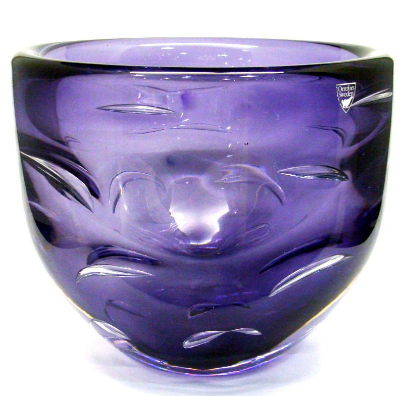 Orrefors Purple Glass Bowl: Orrefors purple glass bowl. Measures 6 1/8" x 7 3/8". For Domestic or International Shipping Quotes Please Feel Call Ryan or Dave at Eagle Shipping Center 561-932-0700 or email them at ryan@eagleshipp