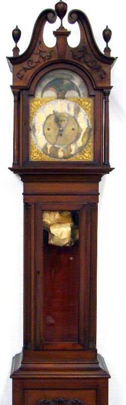 Bawo & Dotter Of NY Grandfather Clock: Bawo and Dotter of NY grandfather clock with moon face dial. Has claw feet. Measures 97 1/2" high x 24 1/4" wide x 16 1/2" depth. For Domestic or International Shipping Quotes Please Feel Call Ryan or
