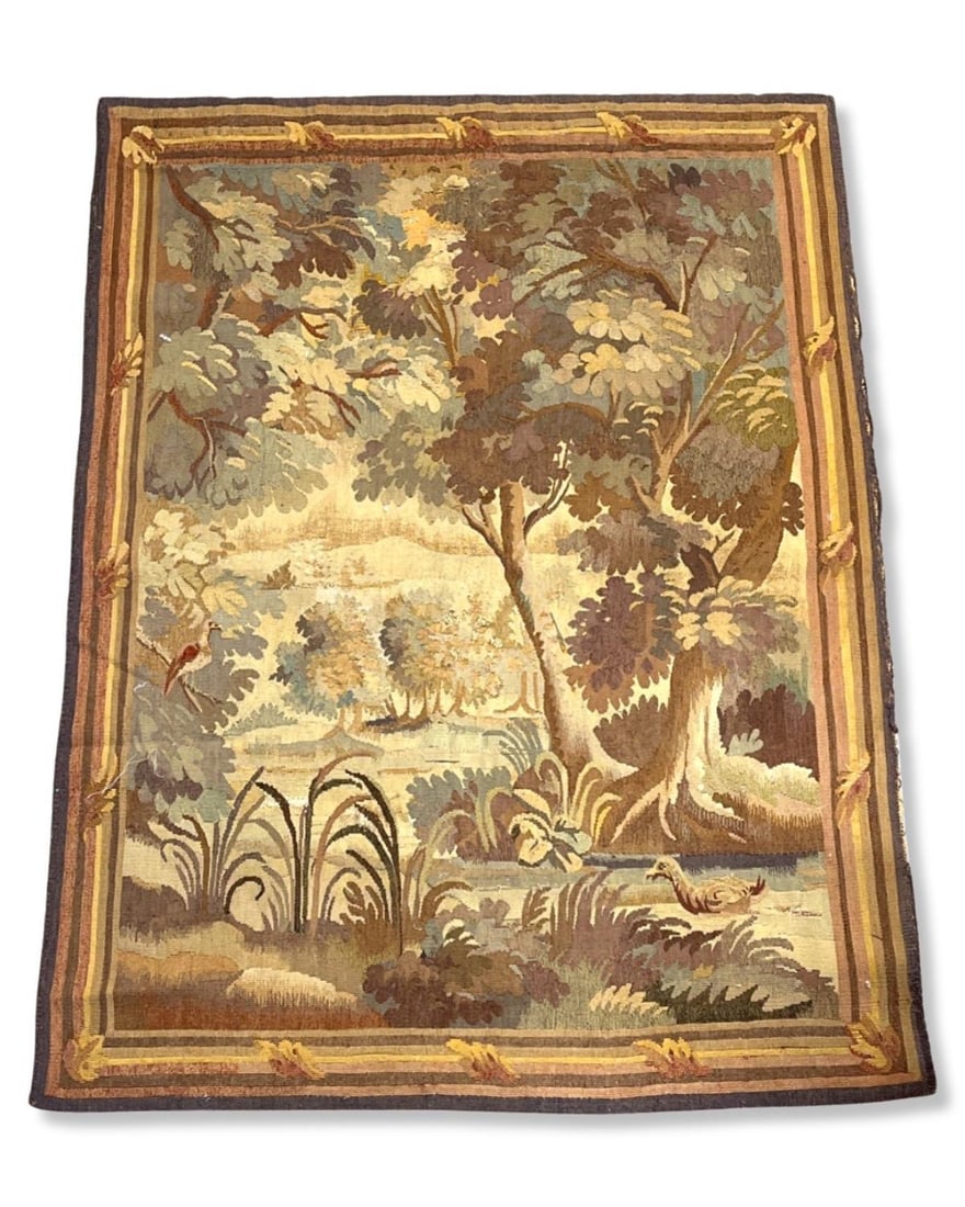 Antique French Aubusson tapestry with a verdant landscape featuring a stream between grassy knolls (1 of 3)