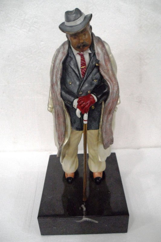 Hiro Yamagata Polychrome Bronze Sculpture: Depicting a man wearing a top coat and with a walking stick. Limited edition 53/375. Signed and dated 1988 on marble base. Measures - Height - 17". For Domestic or International Shipping Quotes Please