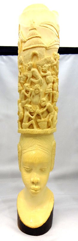 African Carved Ivory Tusk Head: African Carved Ivory Tusk Head. Measures 16 1/4" high.For Domestic or International Shipping Quotes Please Feel Call Ryan or Dave at Eagle Shipping Center 561-932-0700 or email them at ryan@eagleshipp