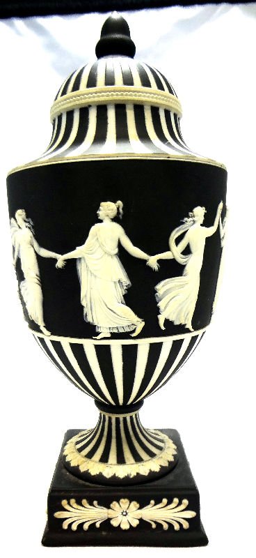 Wedgwood Black Jasperware Covered Urn: Wedgwood Black Jasperware Covered Urn. Measures 10" high.For Domestic or International Shipping Quotes Please Feel Call Ryan or Dave at Eagle Shipping Center 561-932-0700 or email them at ryan@eaglesh