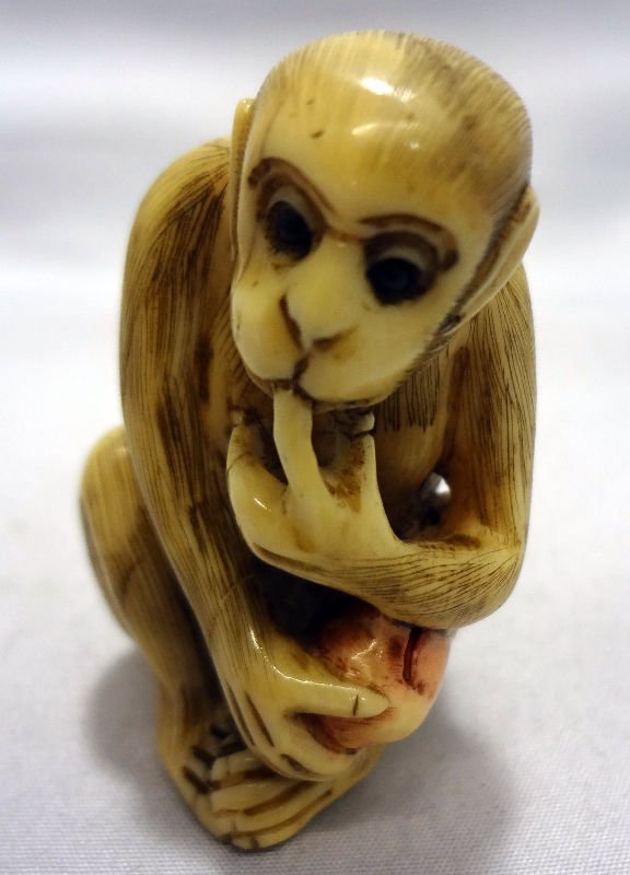 Chinese Ivory Monkey Netsuke: Chinese Ivory Monkey Netsuke. Sucking On Figure. Measures 1 3/4" highFor Domestic or International Shipping Quotes Please Feel Call Ryan or Dave at Eagle Shipping Center 561-932-0700 or email them at 