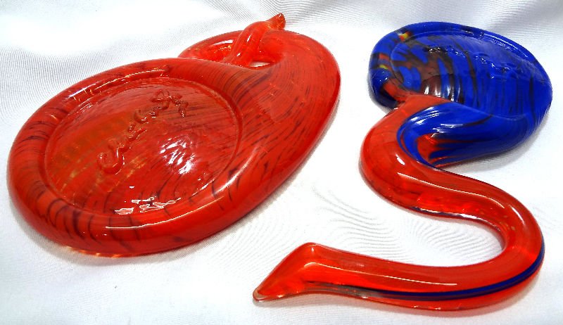 Dale Chiluly Free Form Art Glass - 2 Pieces: Dale Chiluly Free Form Art Glass - 2 Pieces. One solid red and one blue and red. Both signed Chihuly. Measures 6 3/4" high and 7 3/4" in length.For Domestic or International Shipping Quotes Please Fee