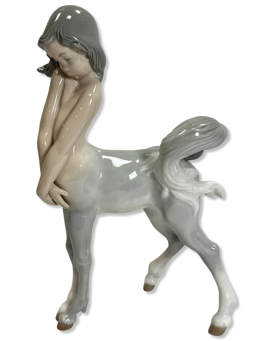 Lladro 1012 Centaur Girl Porcelain Figurine: Lladro 1012 Centaur Girl Porcelain Figurine measures H: 9 1/2" x W: 5 1/2"