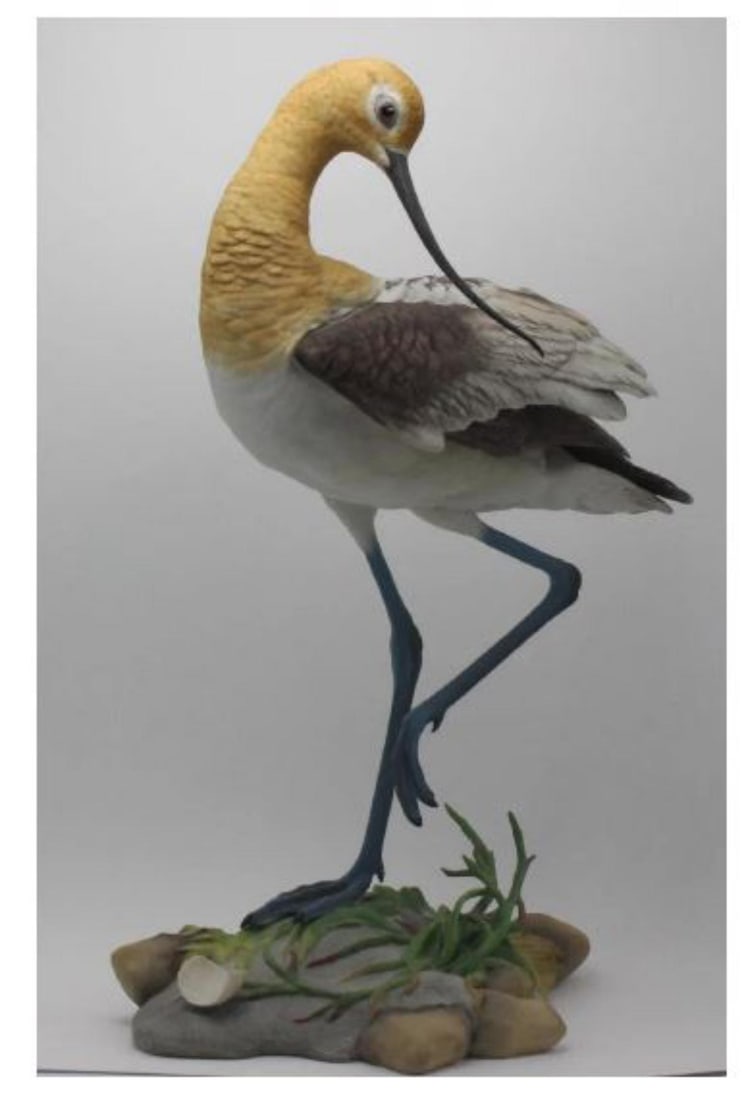 Boehm Porcelain American Avocet Bird Figure: Boehm Porcelain American Avocet Bird Figure signed and numbered 118 measures 16" x 9". Has some broken leaves, sold as is