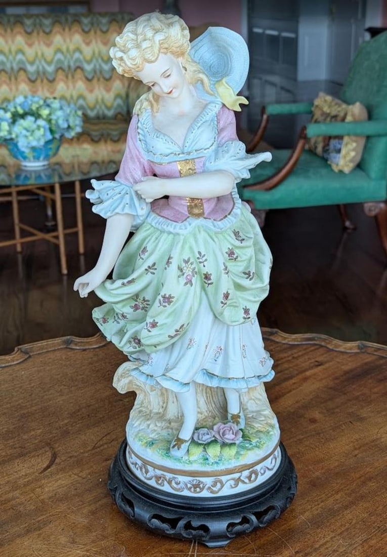 Pair of French Bisque Statues: Pair of French Bisque Statues measures H: 14 1/2"