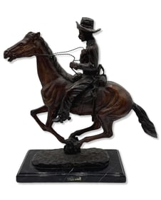 After Frederic Remington (American, 1861-1909) Cowboy on Horseback Bronze Sculpture on Black Marble