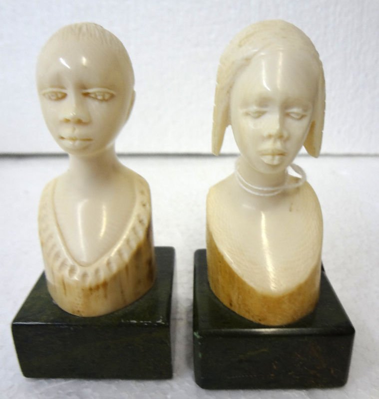 Pair of African Carved Ivory Bust: Pair of African Carved Ivory Bust on marble stand. Measures 3 3/4" high x 2" wide.For Domestic or International Shipping Quotes Please Feel Call Ryan or Dave at Eagle Shipping Center 561-932-0700 or e